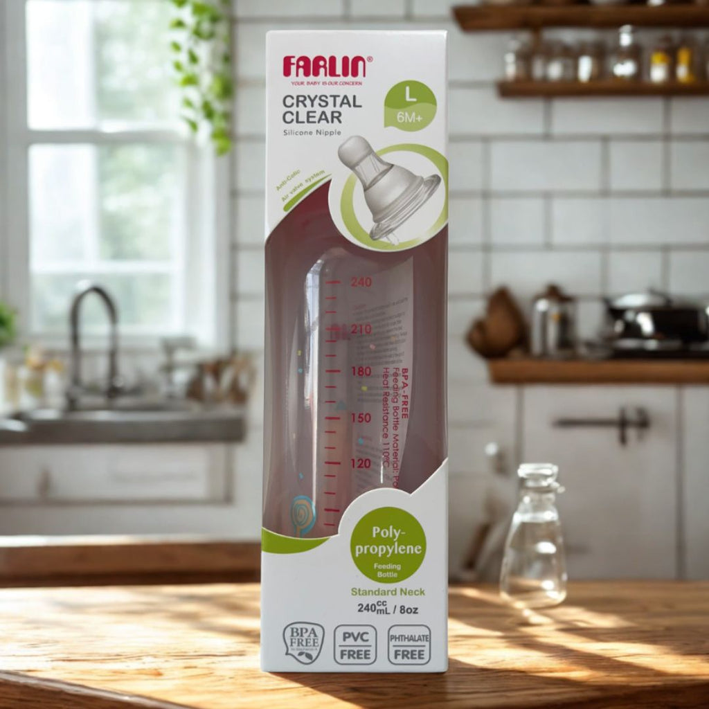 Farlin crystal clear baby bottle packaging on a kitchen counter
