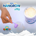 Nestle Nangrow HMO baby formula with a hand using a scoop and milk splash design.
