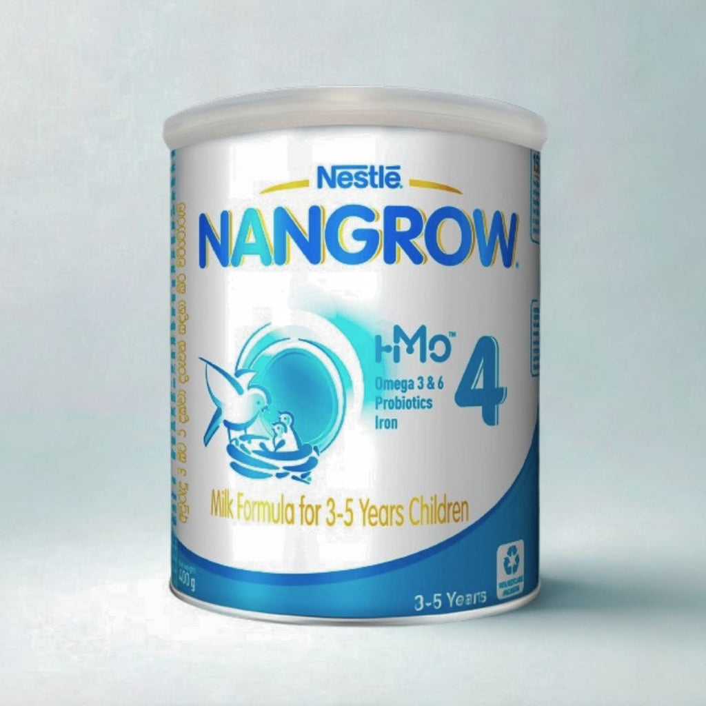 Nestle Nangrow milk formula can for children on a light gray background