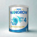 Nestle Nangrow milk formula can for children on a light gray background