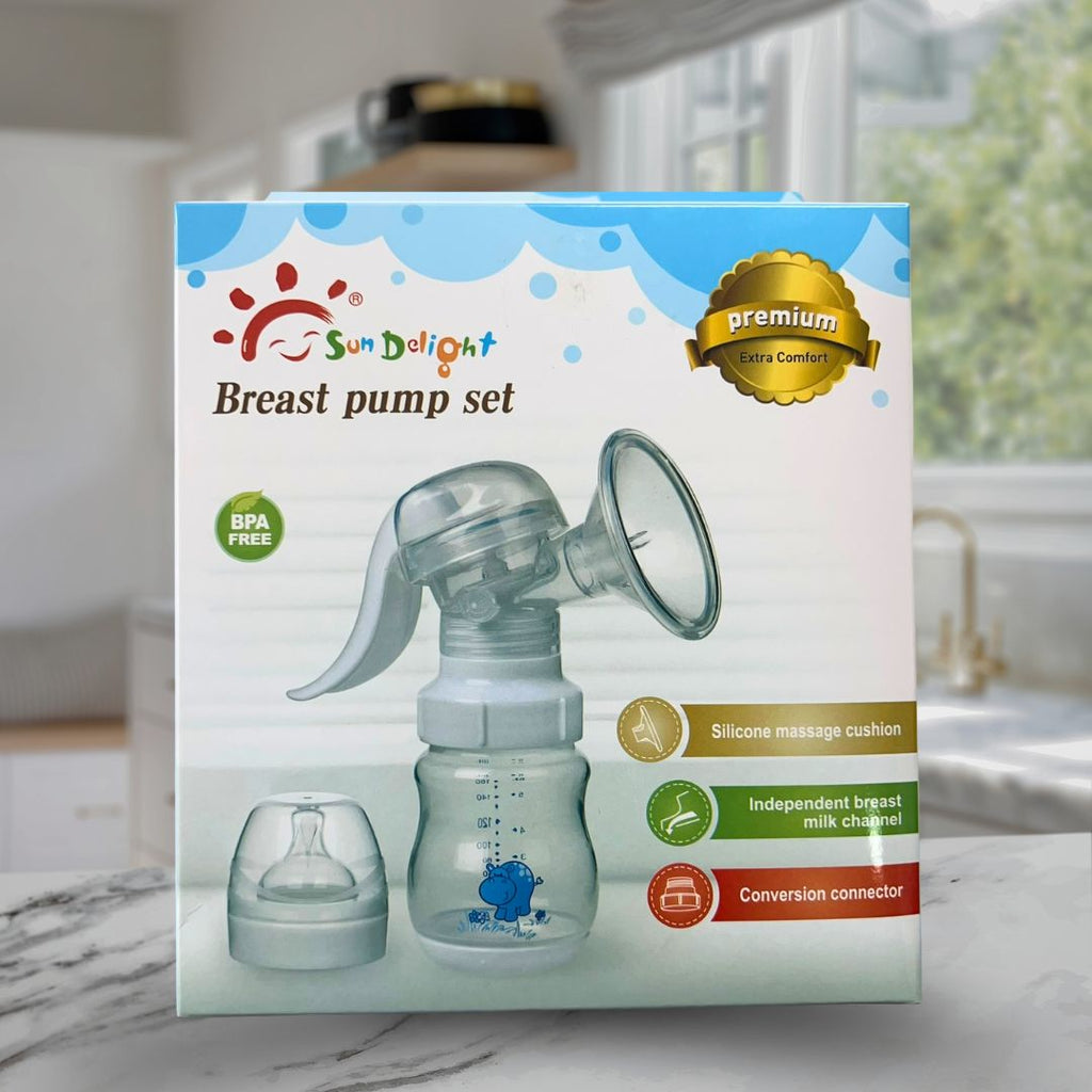 Sun Delight breast pump set packaging on a marble surface with a blurred kitchen background
